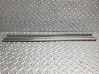 W124 Wagon front left door sill trim gray used OEM