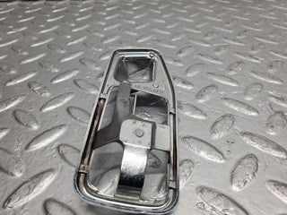 W123 chrome door handle surround left side used OEM