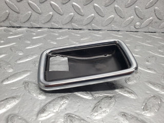 W123 chrome frame door opener right used OEM