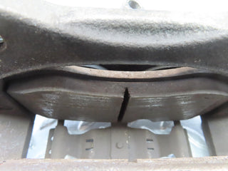 W221 front left brake caliper used OEM