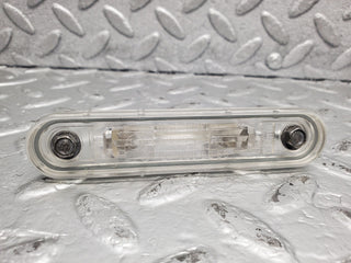W124 Cabriolet number plate light pair used OEM