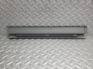 W124 Wagon rear left door sill trim gray used OEM