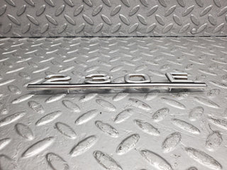 W123 trunk badge logo emblem used OEM