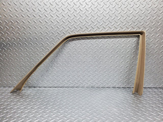 W126 front left door window frame cover used OEM