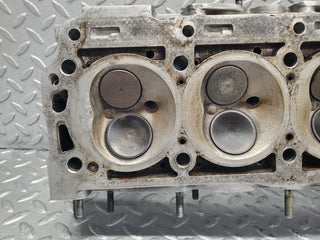 W124 cylinder head used OEM