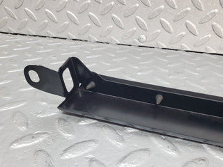 W124 under headlight trim right side used OEM