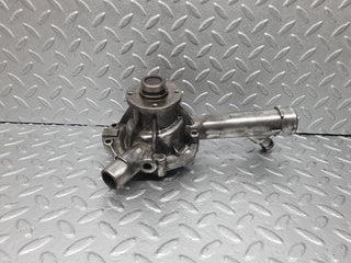 W202 water pump used OEM