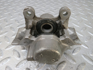 W124 Coupe rear left brake caliper used OEM