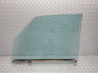 W123 Wagon front right window glass used OEM