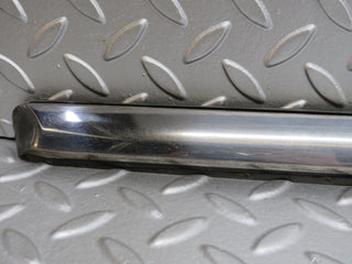 R107 SL left skirt chrome trim strip used OEM