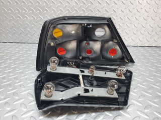W124 tail light right side used OEM