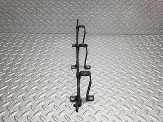 W108 camshaft oil tube with rocker cover supports used OEM