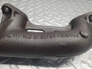 W126 Coupe exhaust manifold left used OEM