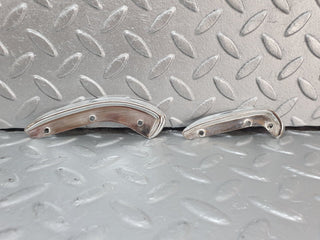 W108 interior door handle chrome trim pair left used OEM