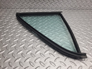 W123 rear left quarter window glass used OEM
