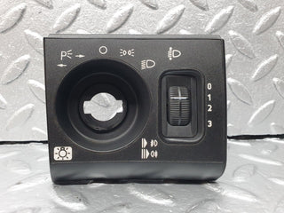 R129 SL headlight switch surround used OEM