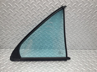 W210 rear left quarter window glass used OEM
