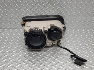 R129 SL xenon headlight left used OEM