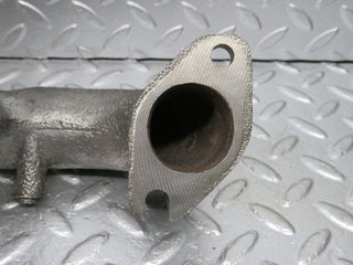 R107 SLC exhaust manifold right side used OEM