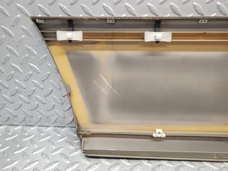 W124 rear left door lower moulding used OEM