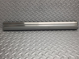 W124 Wagon front left door sill trim gray used OEM