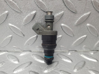 W124 fuel injector used OEM