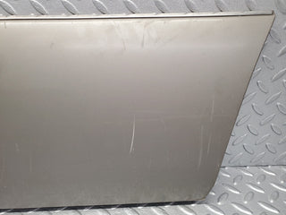 W124 rear left door lower moulding used OEM