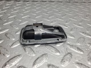 W123 chrome frame door opener right used OEM
