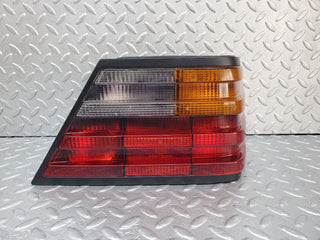 W124 tail light right side used OEM