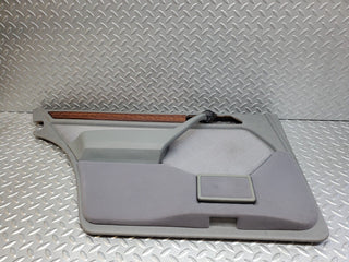 W124 rear left door card grey used OEM