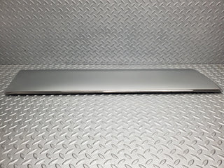 W124 Wagon front left door lower trim used OEM