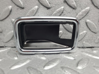 W123 chrome frame door opener left used OEM