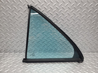 W210 rear left quarter window glass used OEM