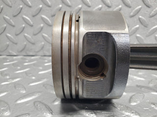 W124 Cabriolet piston with connecting rod used OEM