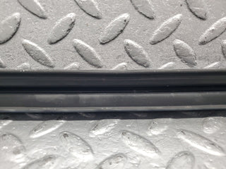 R107 SL front bumper rubber right side used OEM