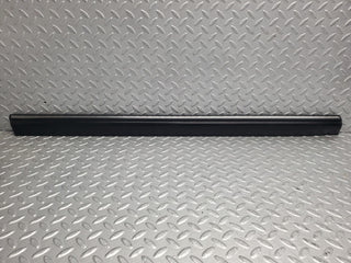 W123 front left door lower moulding trim used OEM