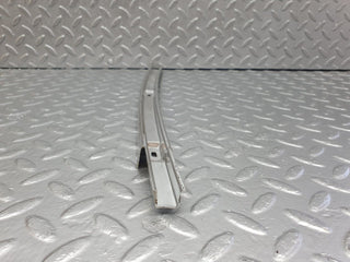 W108 rear left door window chrome channel used OEM