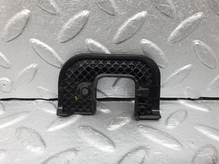 W124 door lock cover left side used OEM