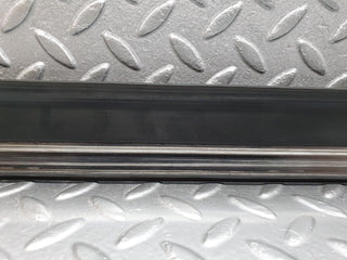 W124 front left door lower moulding trim used OEM