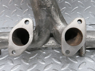 R107 SLC exhaust manifold right side used OEM