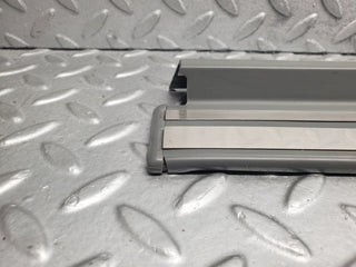 W124 Wagon rear left door sill trim gray used OEM