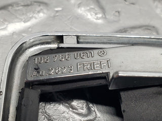 W123 chrome frame door opener right used OEM