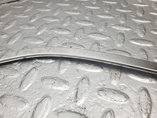 W123 rear left door window chrome frame used OEM