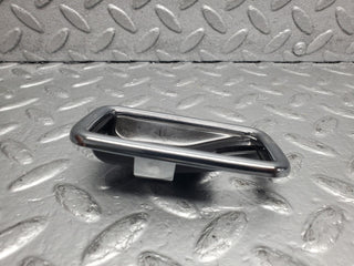 W123 chrome frame door opener right used OEM
