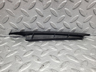 W140 front left door window trim used OEM