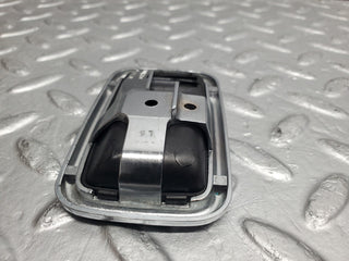 W123 chrome frame door opener left used OEM