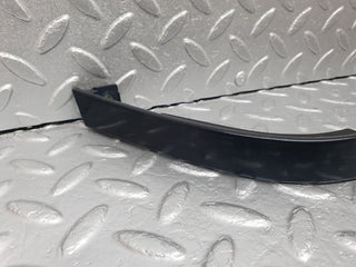 W202 under headlight trim right used OEM
