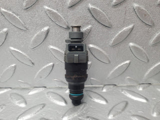 W124 fuel injector used OEM