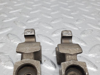 W123 valve rocker arm with retaining spring used OEM