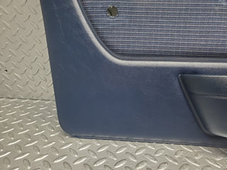W123 front left door card blue used OEM